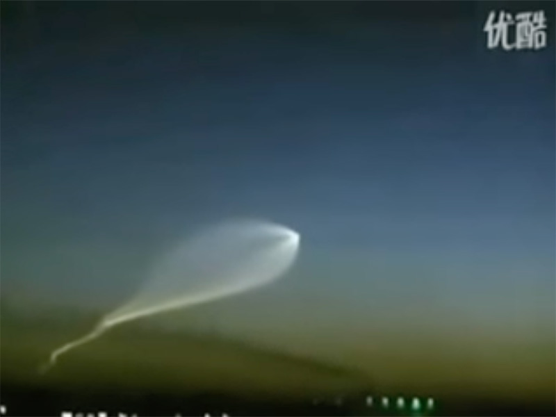 Screenshot of YouTube video of purposed UFO over Hangzhou, China. Most likely a Chinese ballistic missile, the DF-21, or a Progress-M launch from Baikonur.