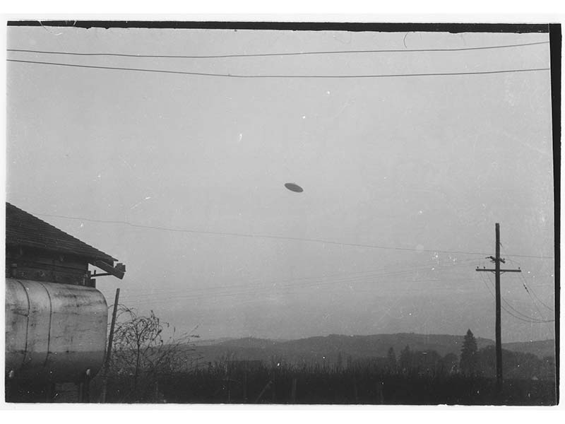 The first of two iconic UFO photos taken by Paul Trent on May 11, 1950, on his family farm near McMinnville, Oregon.