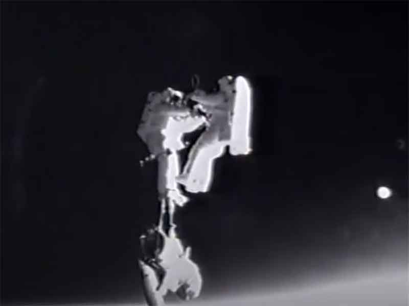 Spacewalking Astronauts Point Out a UFO