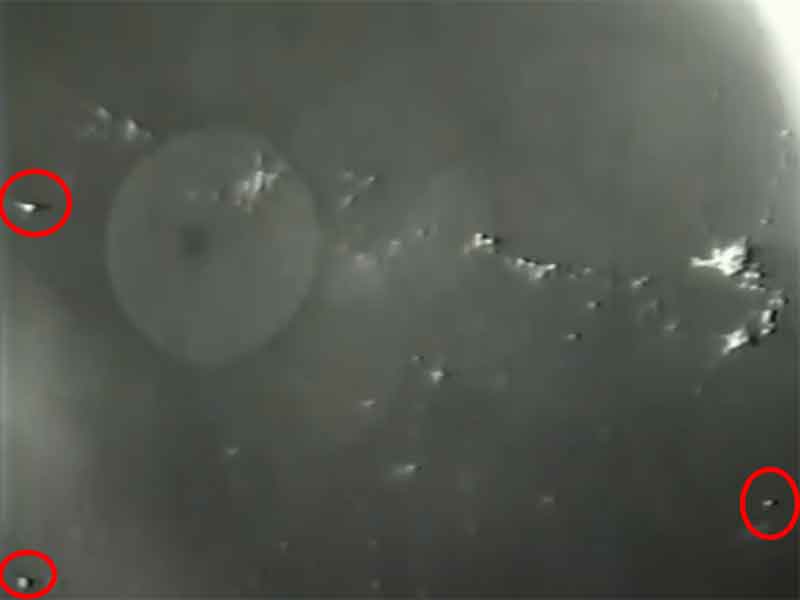UFO Fleet Passes NASA Shuttle Above Storms